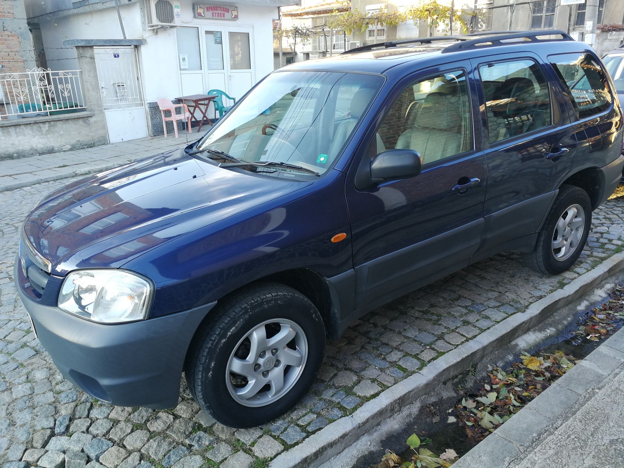 на части Mazda Tribute 2.0