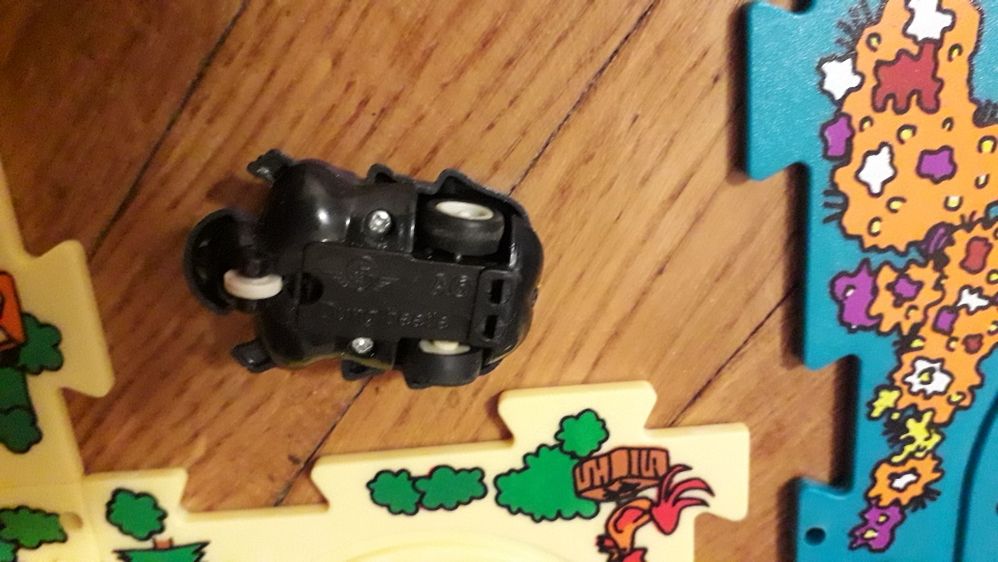 Puzzle-uri din plastic cu gandacel pe roti pentru plimbare pe puzzle