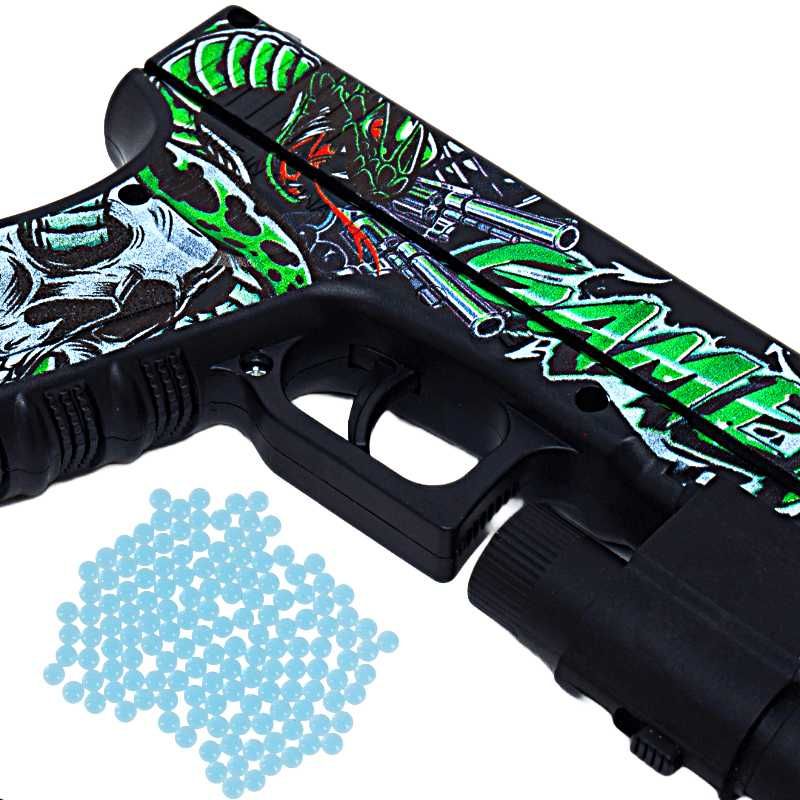 Pistol Glock 17 cu 500 de Bile Gel de Apa si Laser Cu skin Gamer Verde