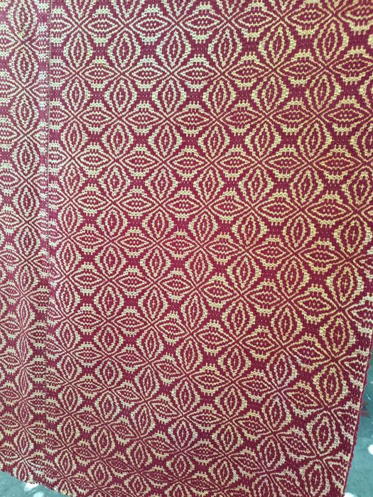 Macat de lână roșu