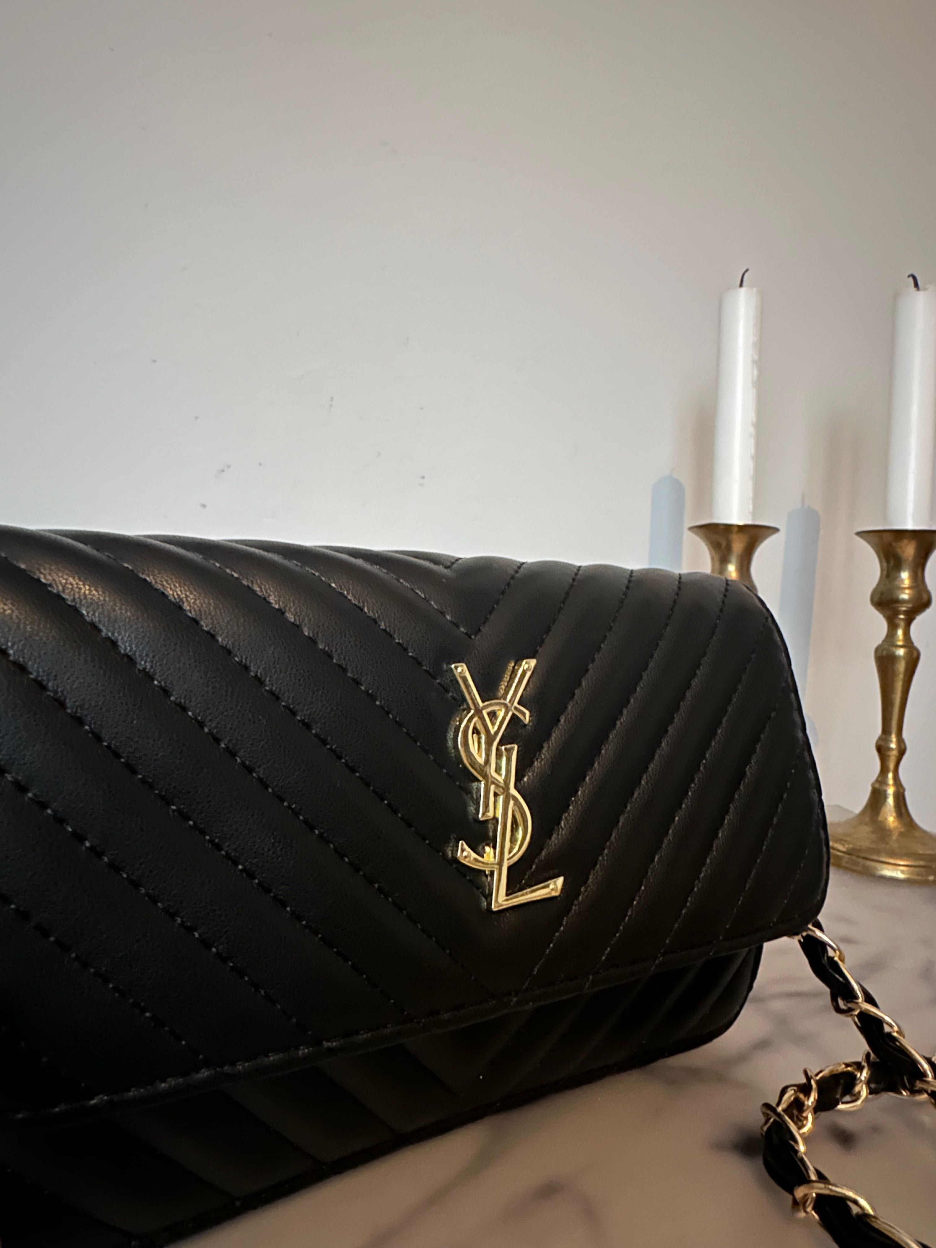 Малка черна чанта от естествена кожа YSL.