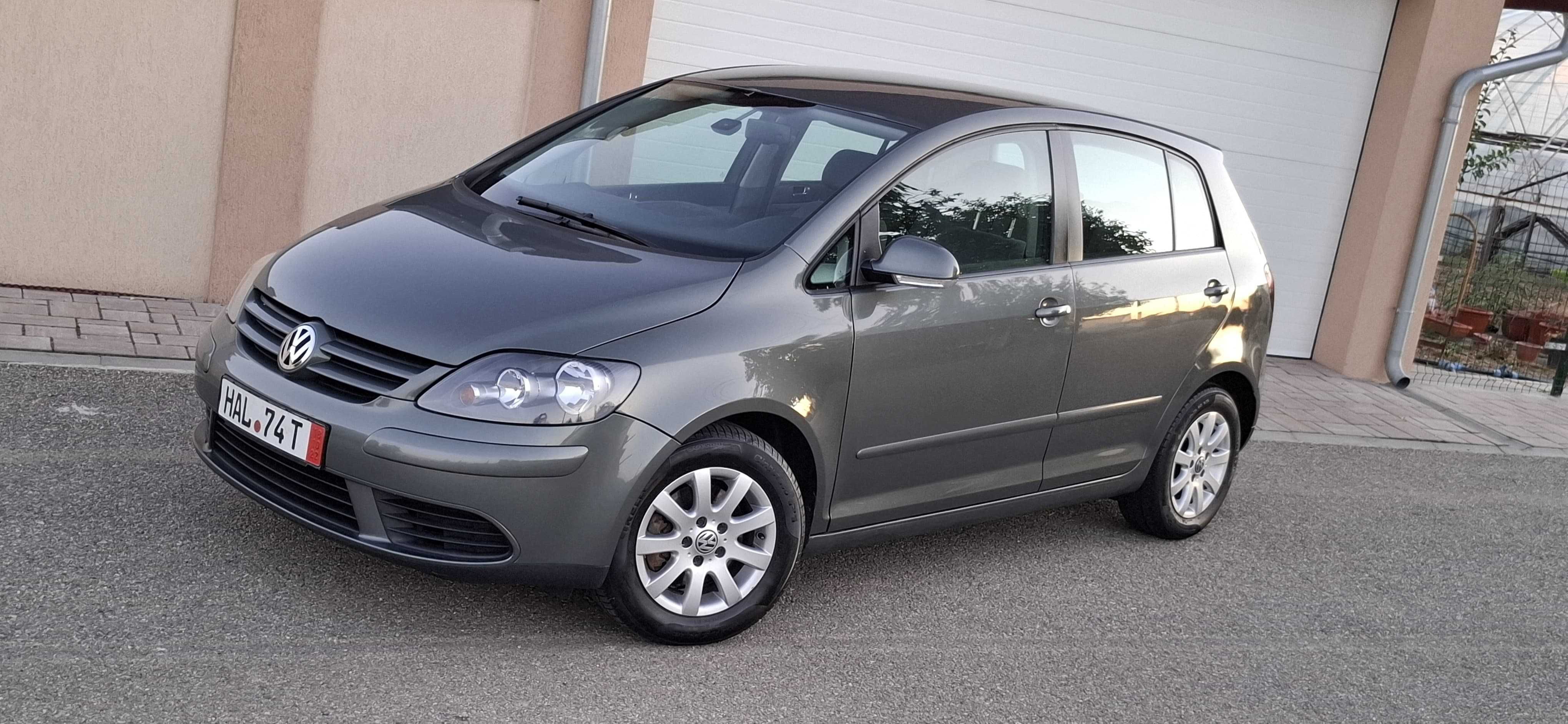 Golf 5 plus. 2006 1.6 benzina 115 Cp Climatronic,incalzire in scaune
