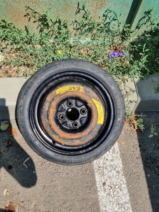 Roata  rezerva slim logan .