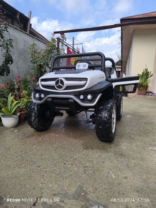 Mașinuță electrică.