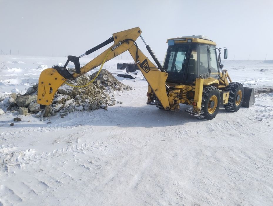 Услуги экскаватора погрузчика с гидромолотом в Хромтау