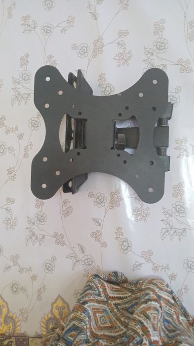 Кронштейн телевизорды уголга катырыу ушын