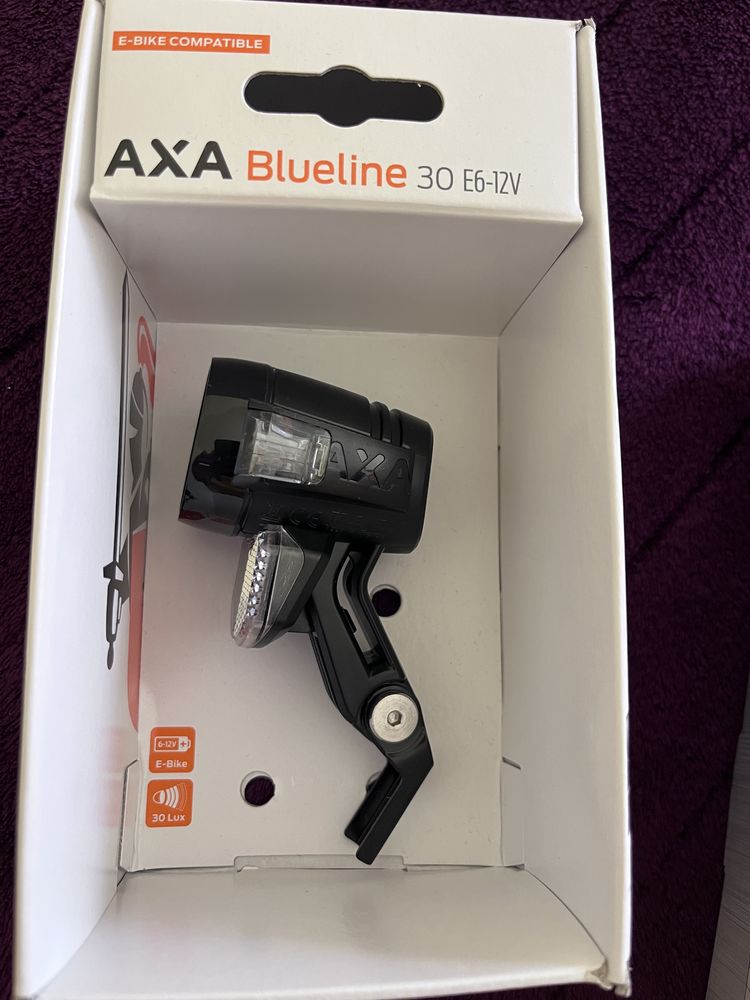 Far bicicleta electrica AXA Blueline 30