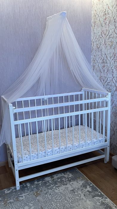 Кроватка с маятником приставная