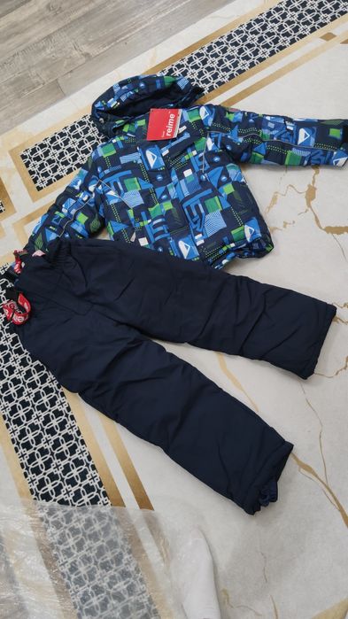 Продам новый зимний костюм