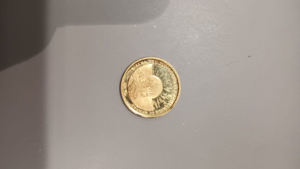 Vând moneda aur 18k