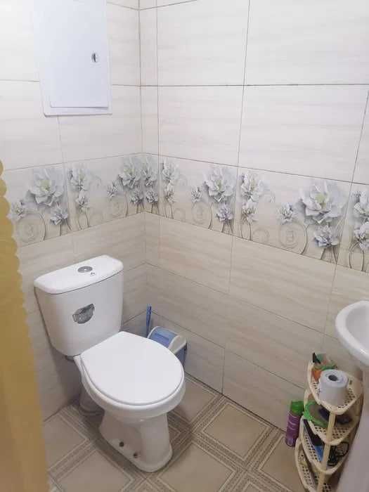 Продаётся квартира Юнусабад Бодомзор 2 ком 1 этаж (Бивший обшежития)