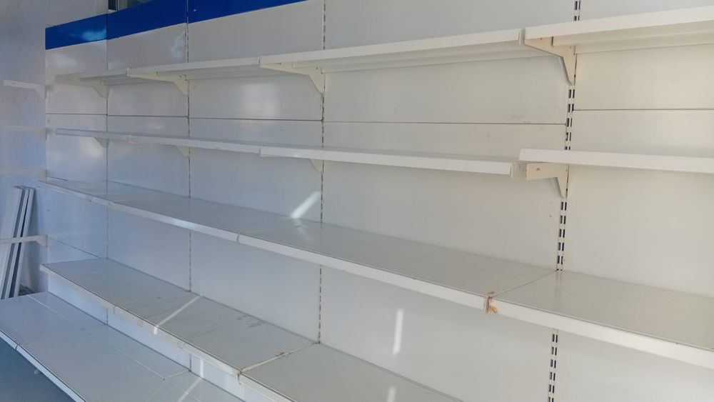 Продам б/у стеллажи для магазина