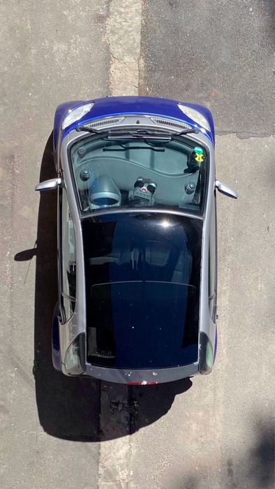Smart ForTwo cu AC, scaune încalzite și panoramic.