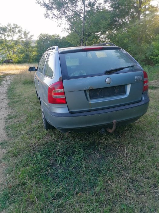 Dezmembrez skoda octavia 2 combi 1,6 benzină  cod motor BGU 75kw