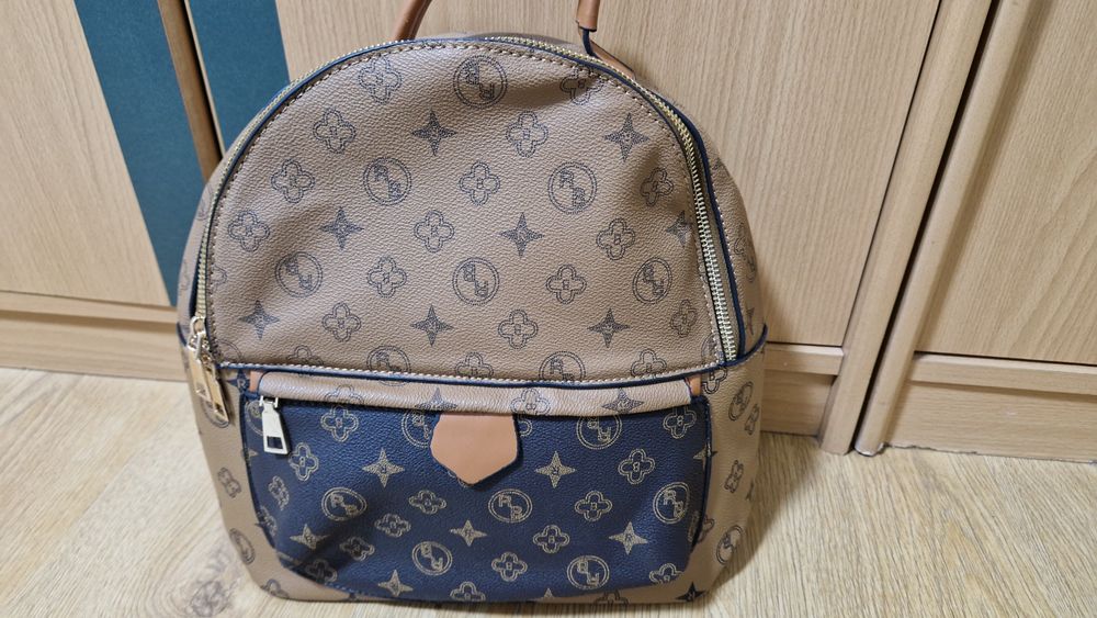 2 la preț de 1 plus cadou, un portofel