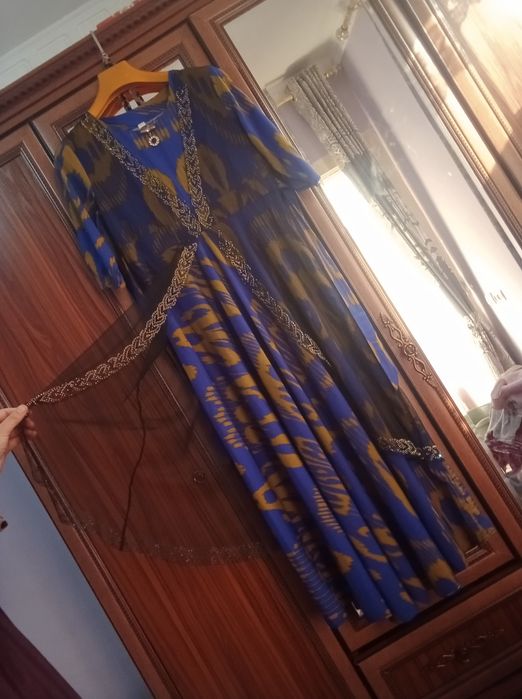 Milliy kiyim adras koʻylak uzun qizlarimizga mos keladi judayam yaxshi