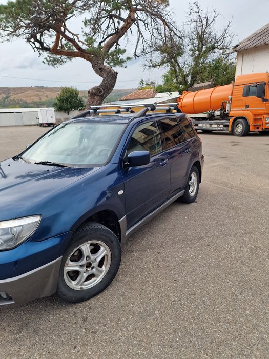 Vând mitsubishi outlander l