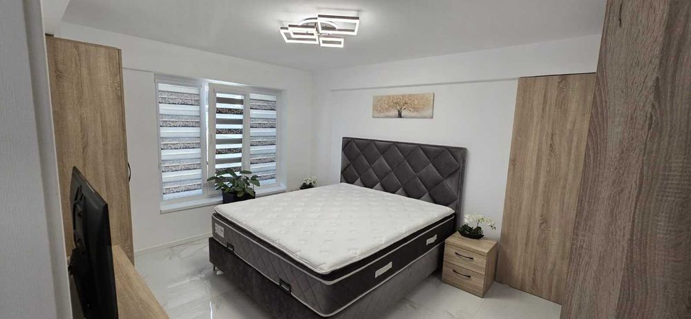 apartament 2 cam + curte 60 mp + foisor + parcare , prima inchiriere**