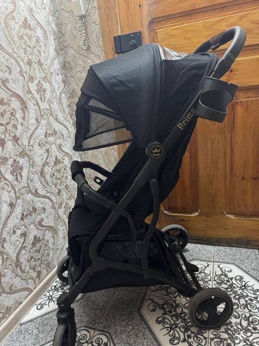 Коляска прогулочная,легко собирается,удобно в поездку