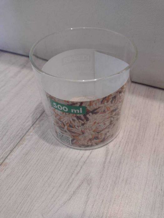 Свещник 3 броя свещи с декорация камъни и бял пясък