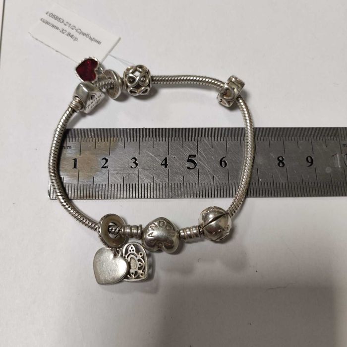 Сребърна гривна Pandora с шест талисмана 32.84гр.