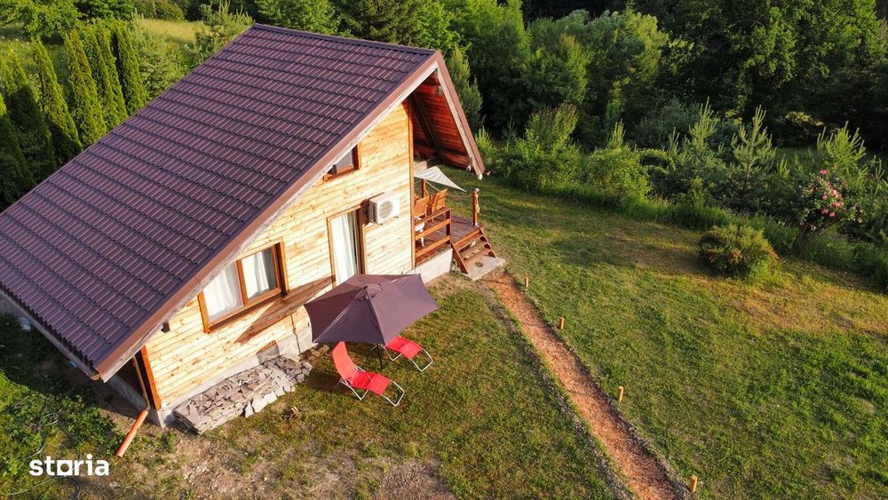 Cabana situată pe un teren de 8.638 mp, cu pădure (intra&extravilan).