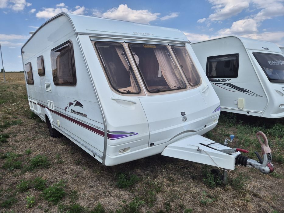 Rulota Swift Carisma 2006 4/5 locuri