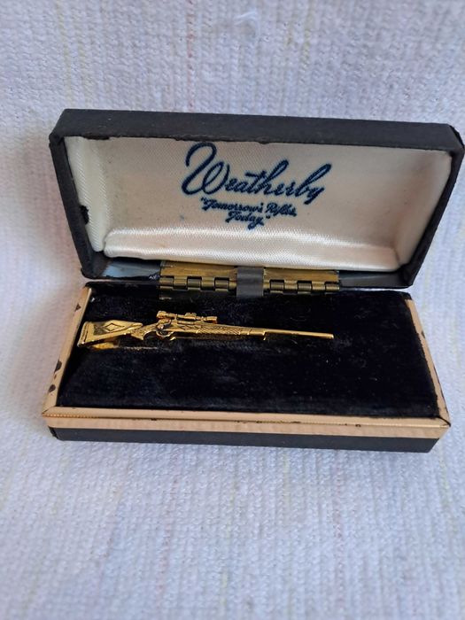 ac de cravata Weatherby gold rifle anii 1950