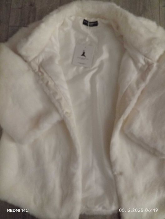 Чисто ново палто