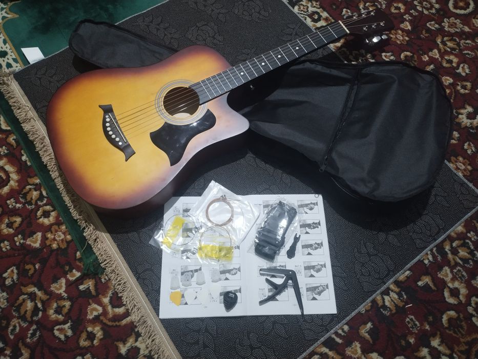 Akustik gitara Yangi