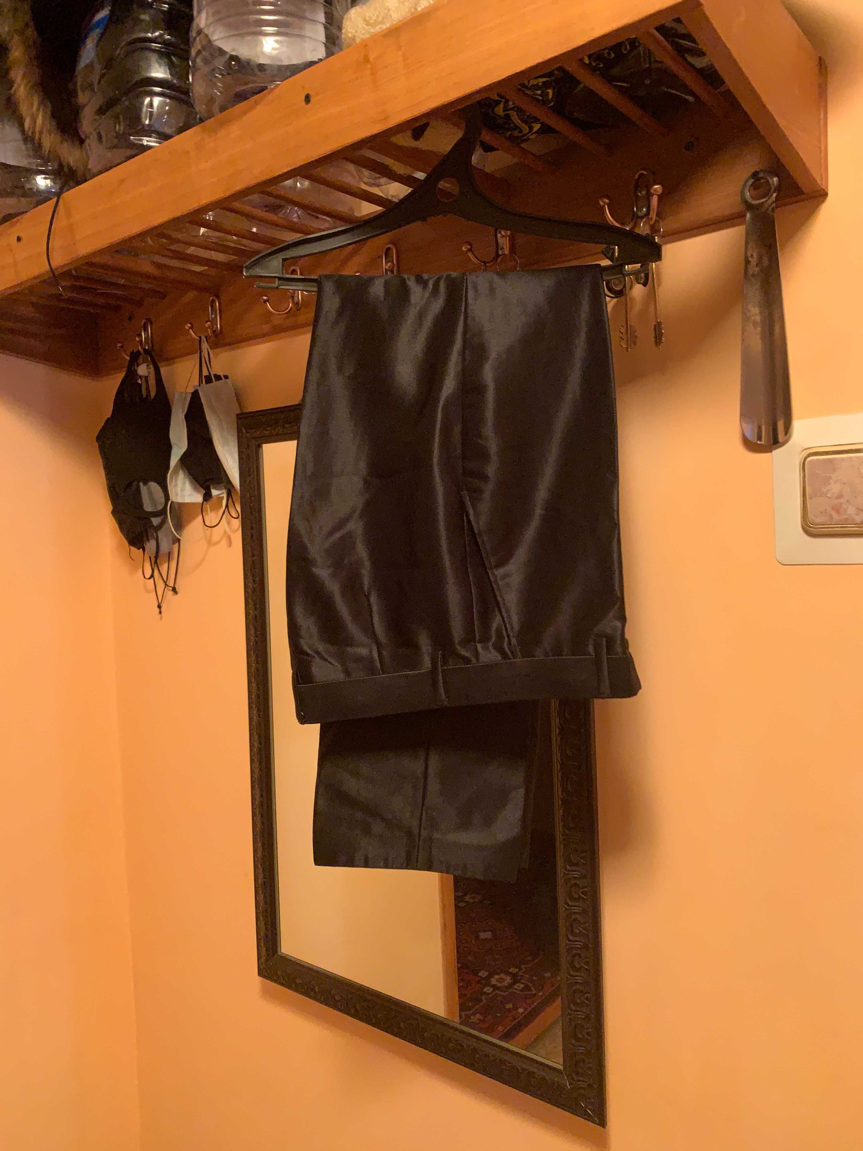Продам костюм мужской из полиэстера черного цвета (сделано в Турции)