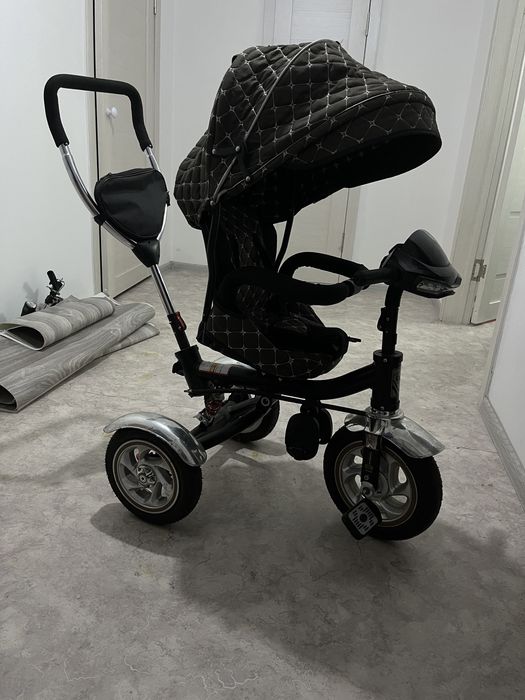 Детский велосипед с музыкой и козырьком от дождя и ветра