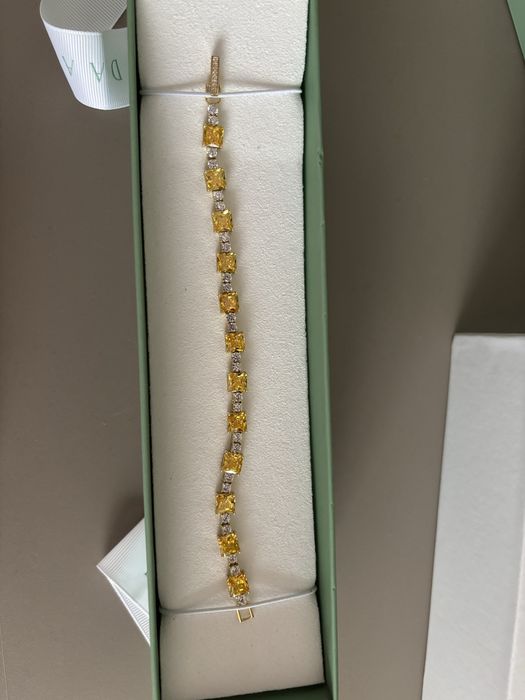 Bratara tennis DAAR din argint galben.Certificat de garantie