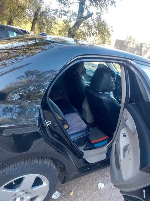 Тайота карола сатылады жыл2011 об 1.8 каропка автомат 4 зимний дангеле