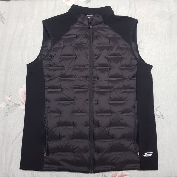 Желетка скечерс.