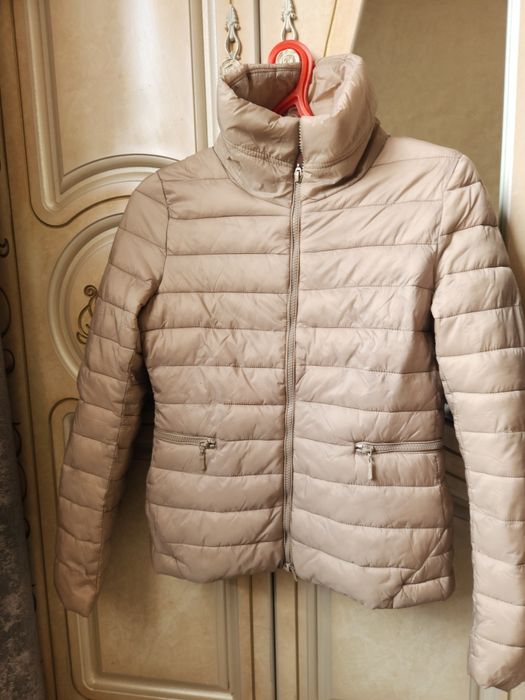 Короткий куртка .