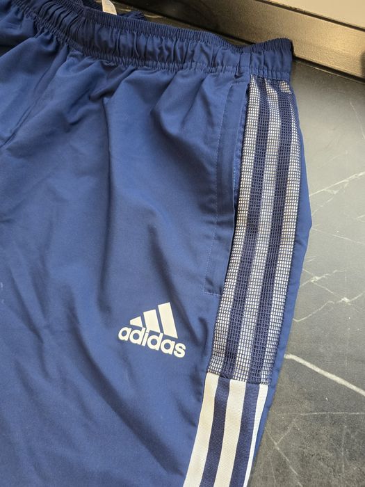Pantaloni de trening Adidas de fâș L