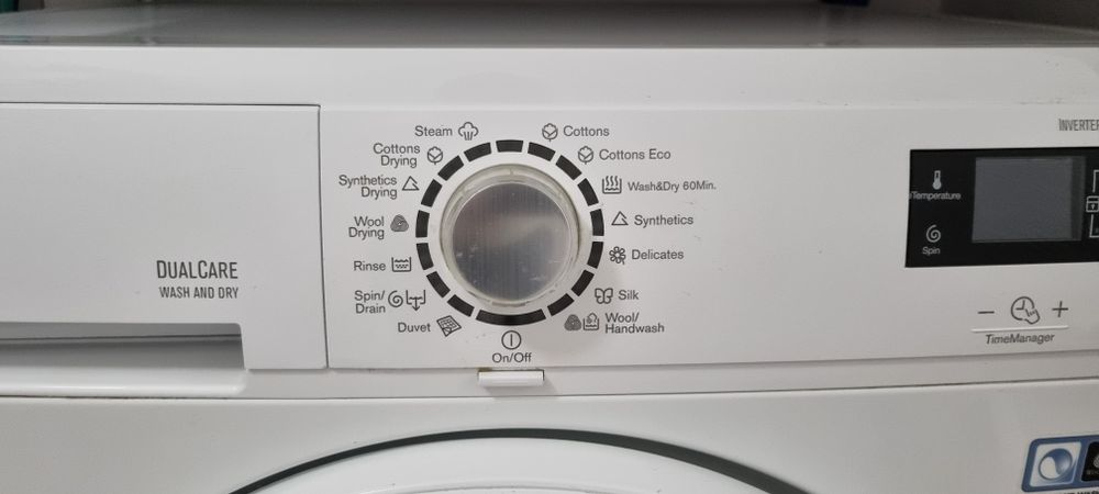 Masina de spalat rufe cu uscator Electrolux  EWW1476WD