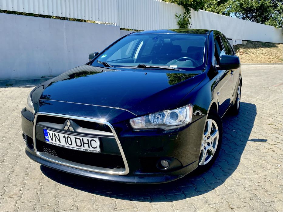 Mitsubishi Lancer - 1.6i - 2010 - xenon - carte service