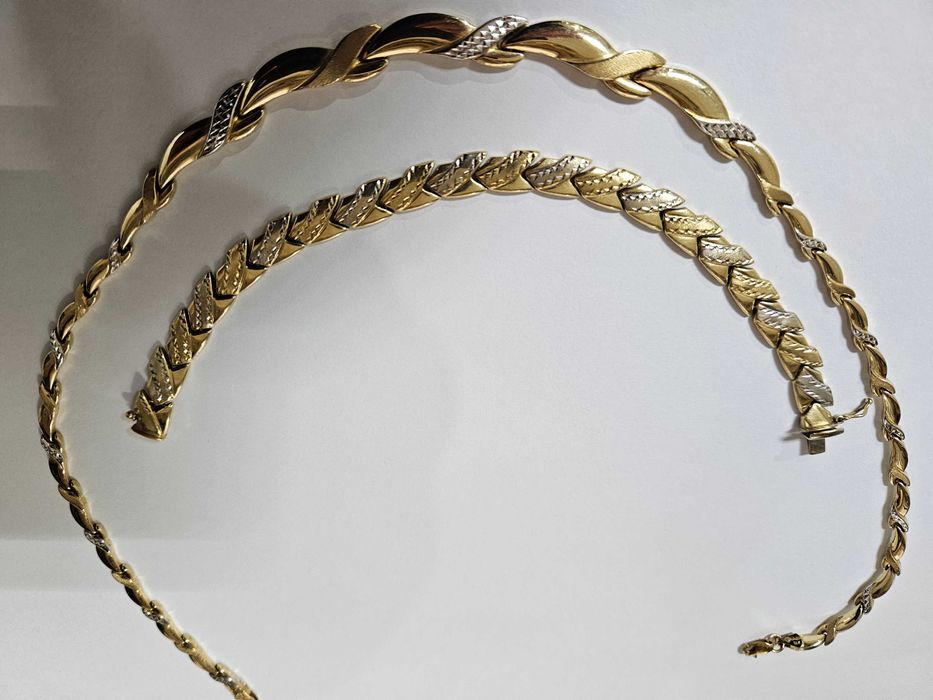 Aur Set Colier 14 K, 300 lei gramul.