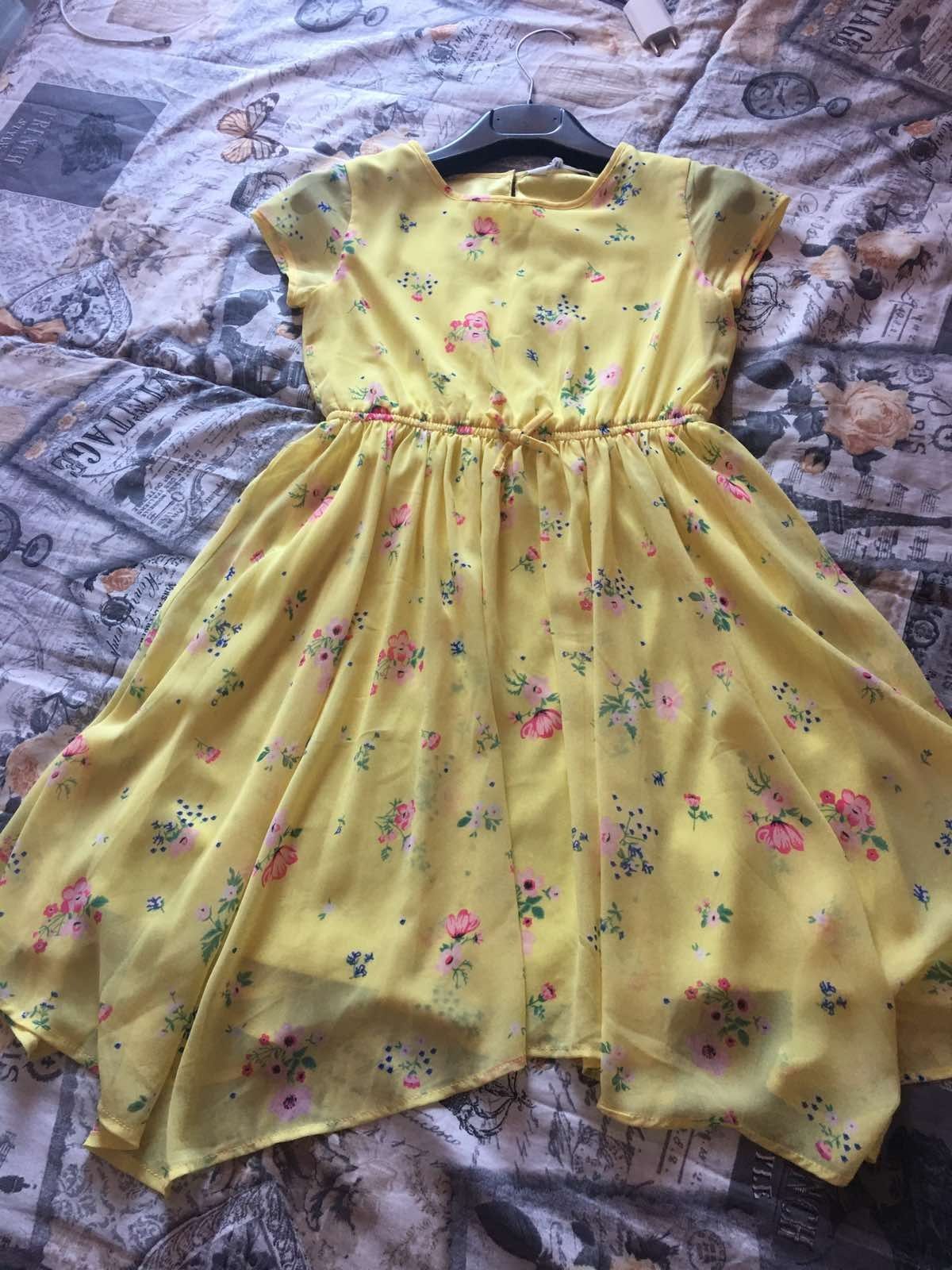 Детска рокля на НМ 9-10г.