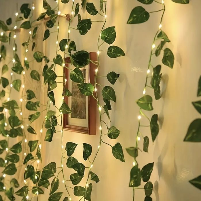 Ghirlandă luminoasă cu frunze artificiale