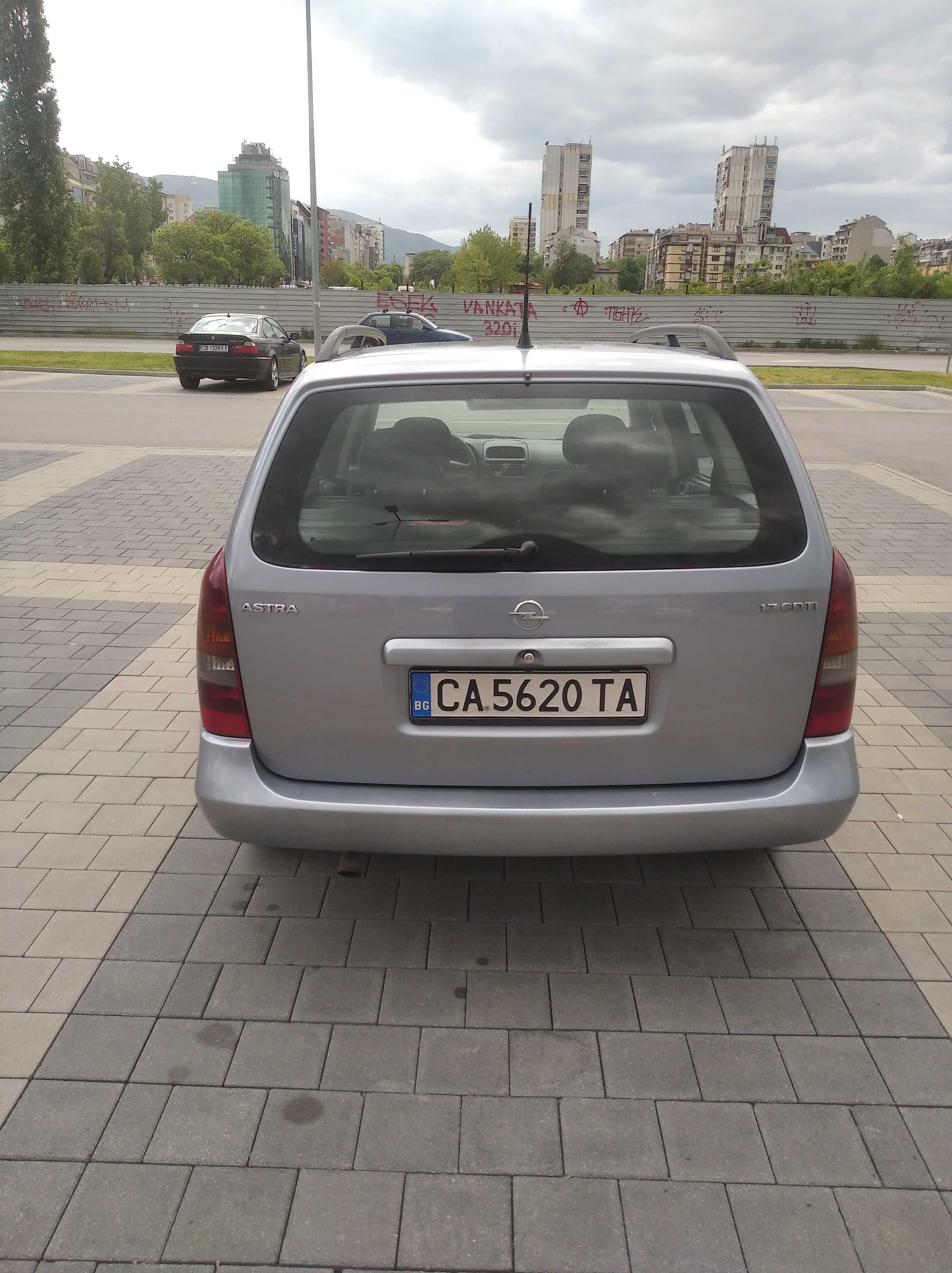 Купе Opel Astra 2004 комби CDTI 82 k.c.