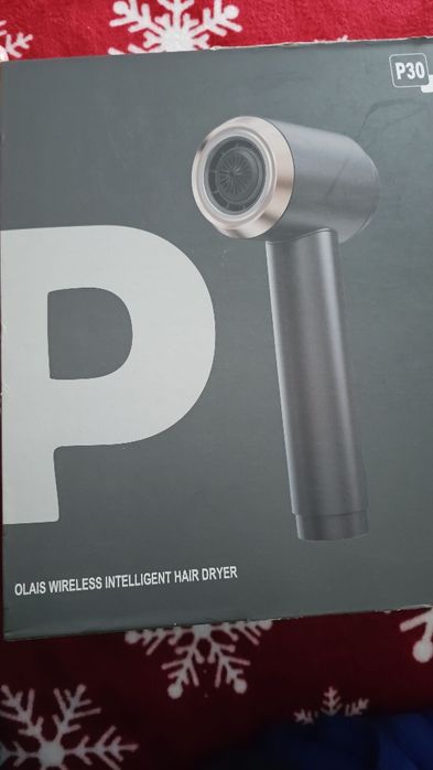 Uscător de păr portabil