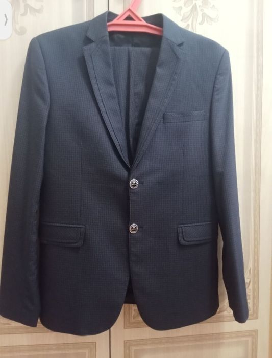 Костюм с брюками 48р