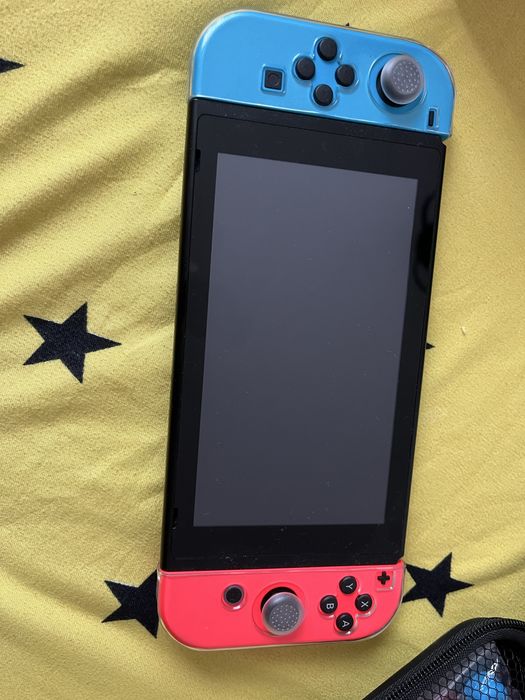 NINTENDO SWITCH  folosit foarte putin!