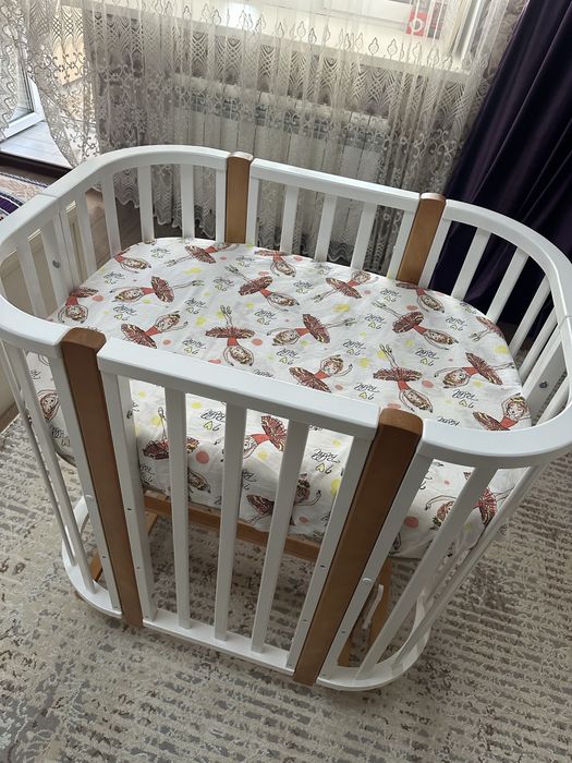 Продам детскую кроватку с маятником Nuvola lux