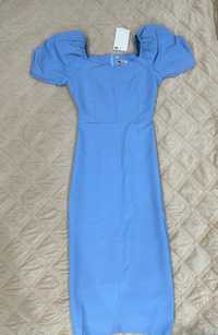Продам новое платье голубое