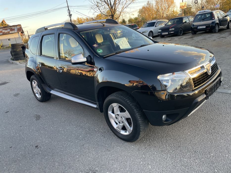 Dacia Duster benzina 1.6 110 cai tractiune 4x4 model prestige