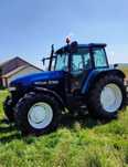 Remorca Deutz Fahr si tractor New Holland 100 cp